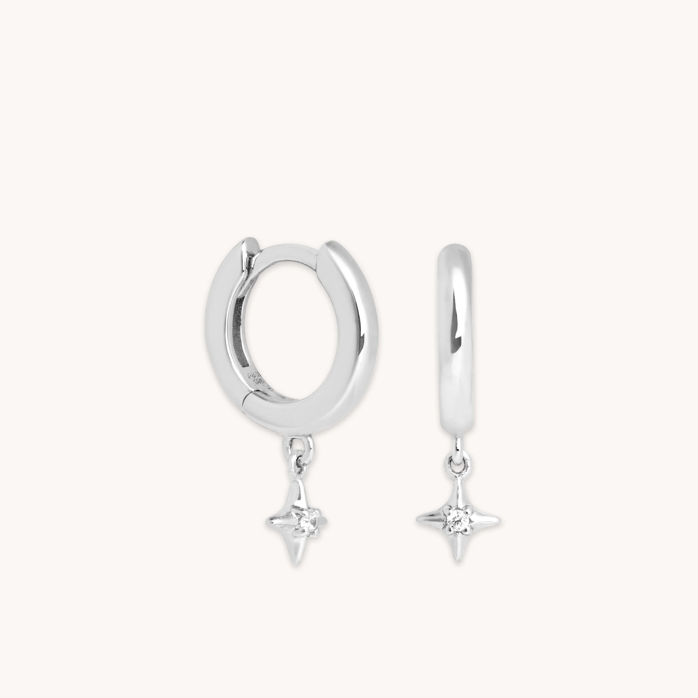 Cosmic Star Charm Huggies in Silver