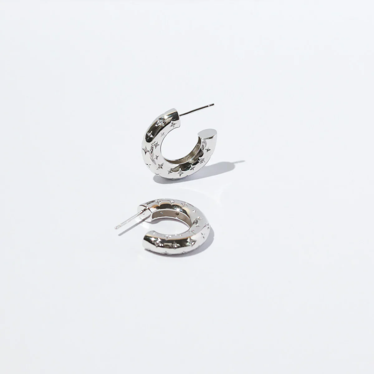 Cosmic Star Dome Hoops in Silver - Image 4