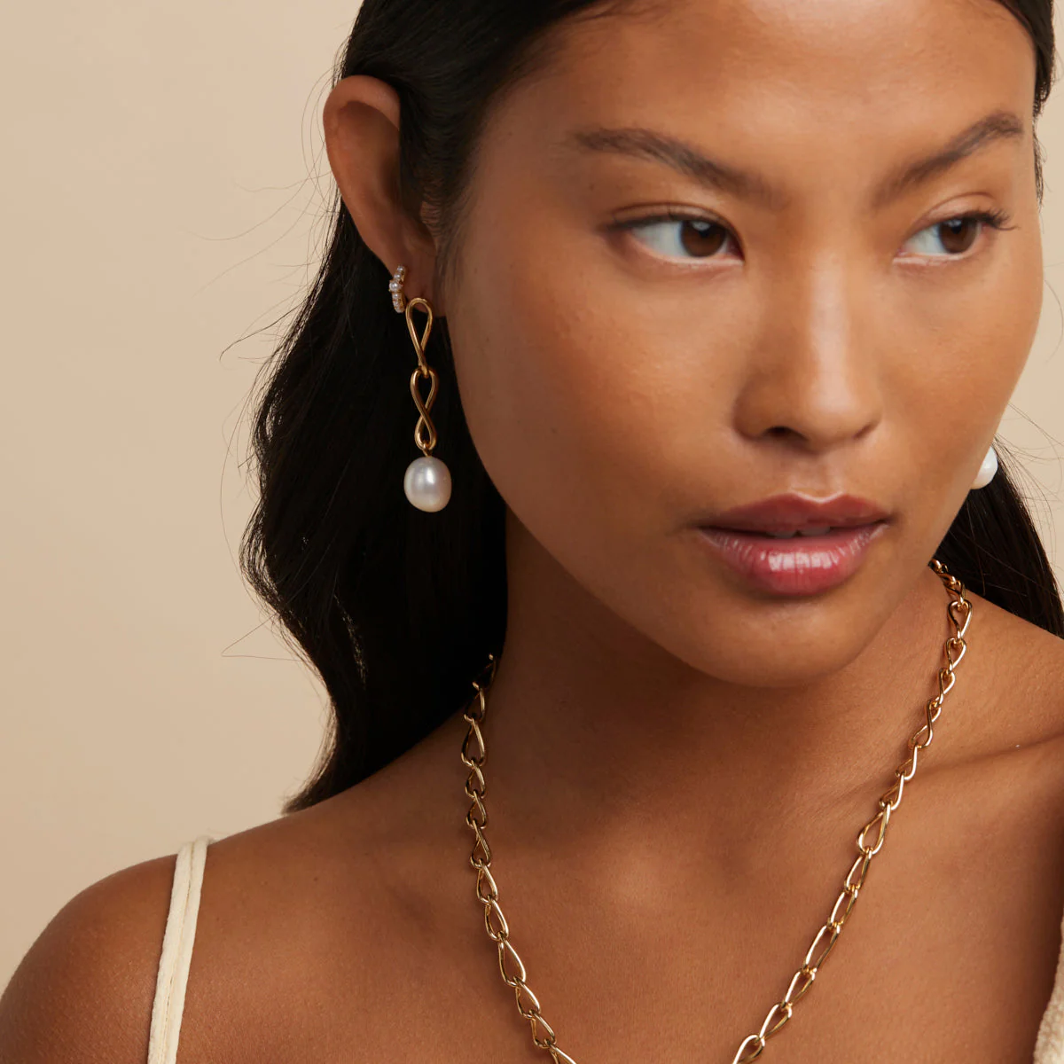 Infinite Pearl Drop Studs in Gold - Image 6