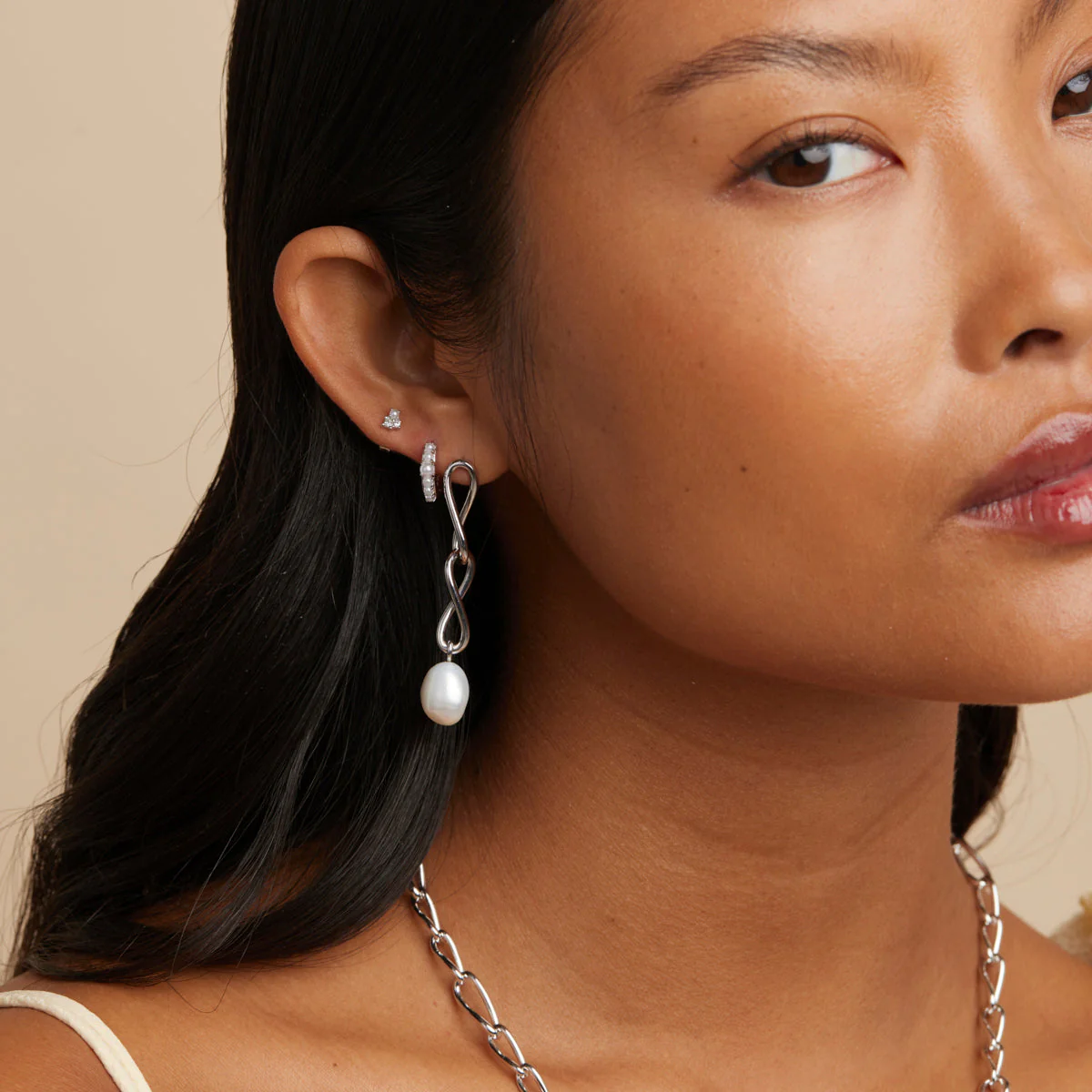 Infinite Pearl Drop Studs in Silver - Image 3