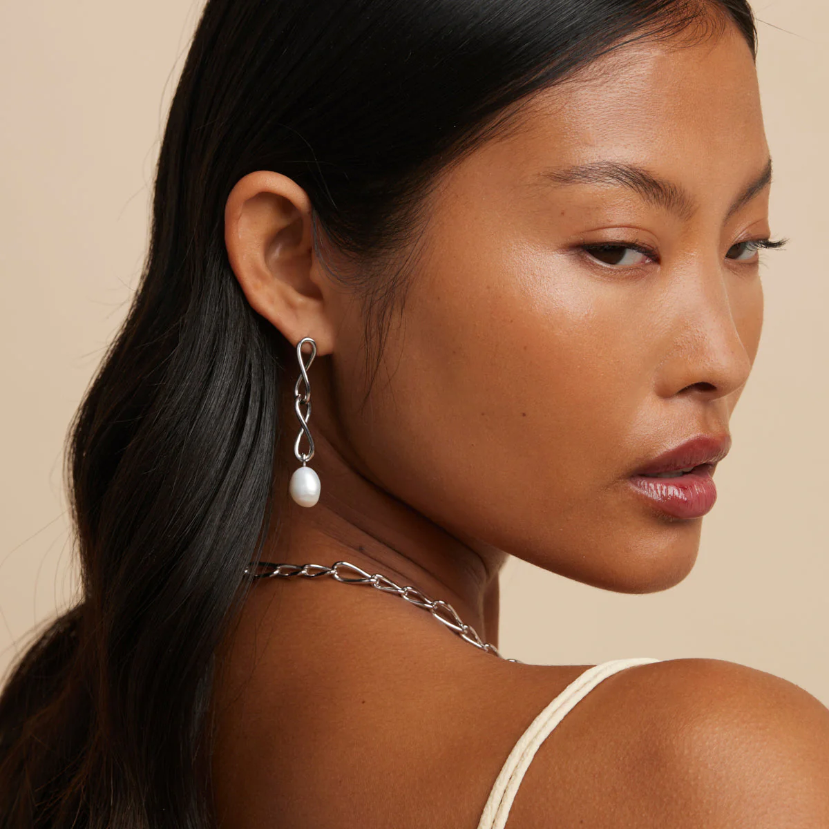 Infinite Pearl Drop Studs in Silver - Image 4