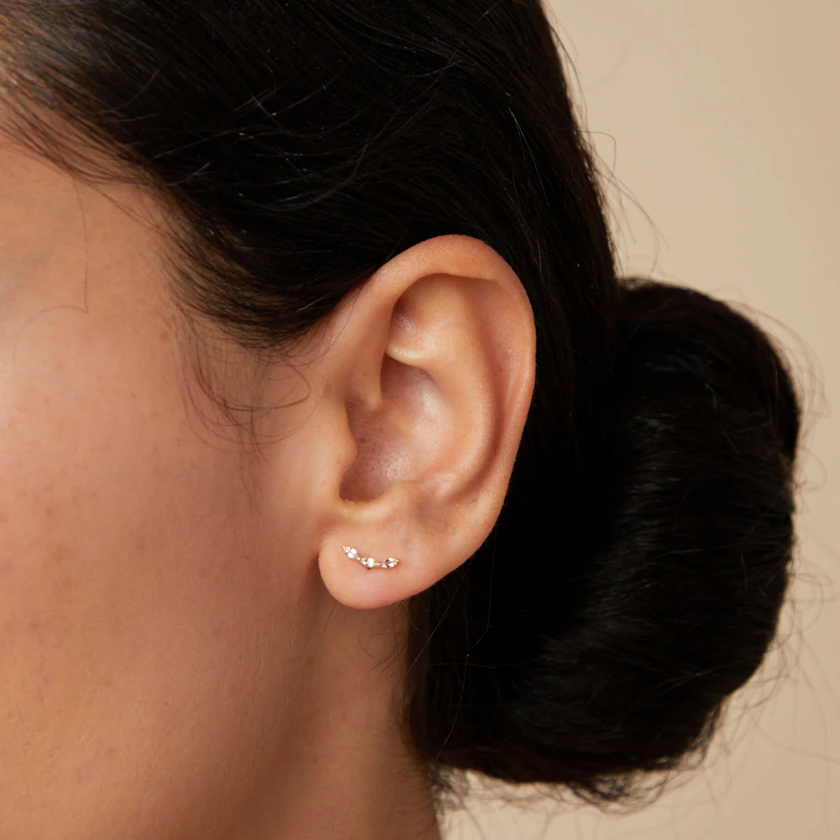 White Topaz Curved Studs in Solid Gold - Image 2